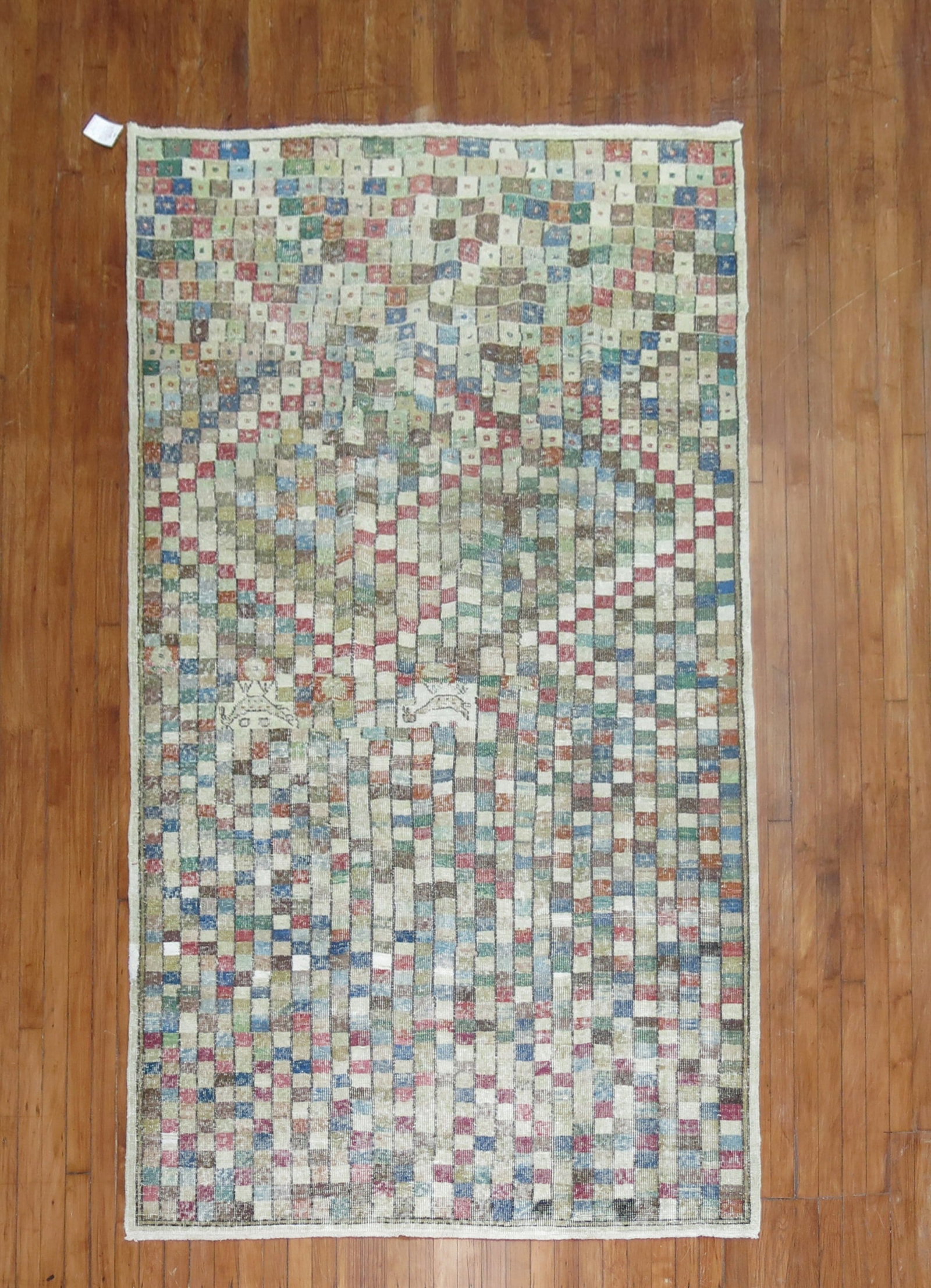 5' x 8' 10" Anatolian pictorial rug Turkish Deco style: 5' x 8' 10" Anatolian pictorial rug Turkish Deco style Mid-20th century Turkish Deco rug featuring small animals within an all-over checkerboard pattern. This pre-owned pictorial rug combines decorati