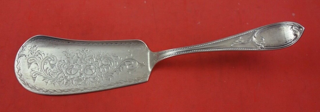 Antique Brite Cut Sterling Silver Ice Cream Server 10 1/4" 1828-1869: Antique Brite Cut Sterling Silver Ice Cream Server 10 1/4" 1828-1869 Experience the elegance of this Brite Cut Sterling Silver Ice Cream Server, crafted by various makers between 1828 and 1869. This e