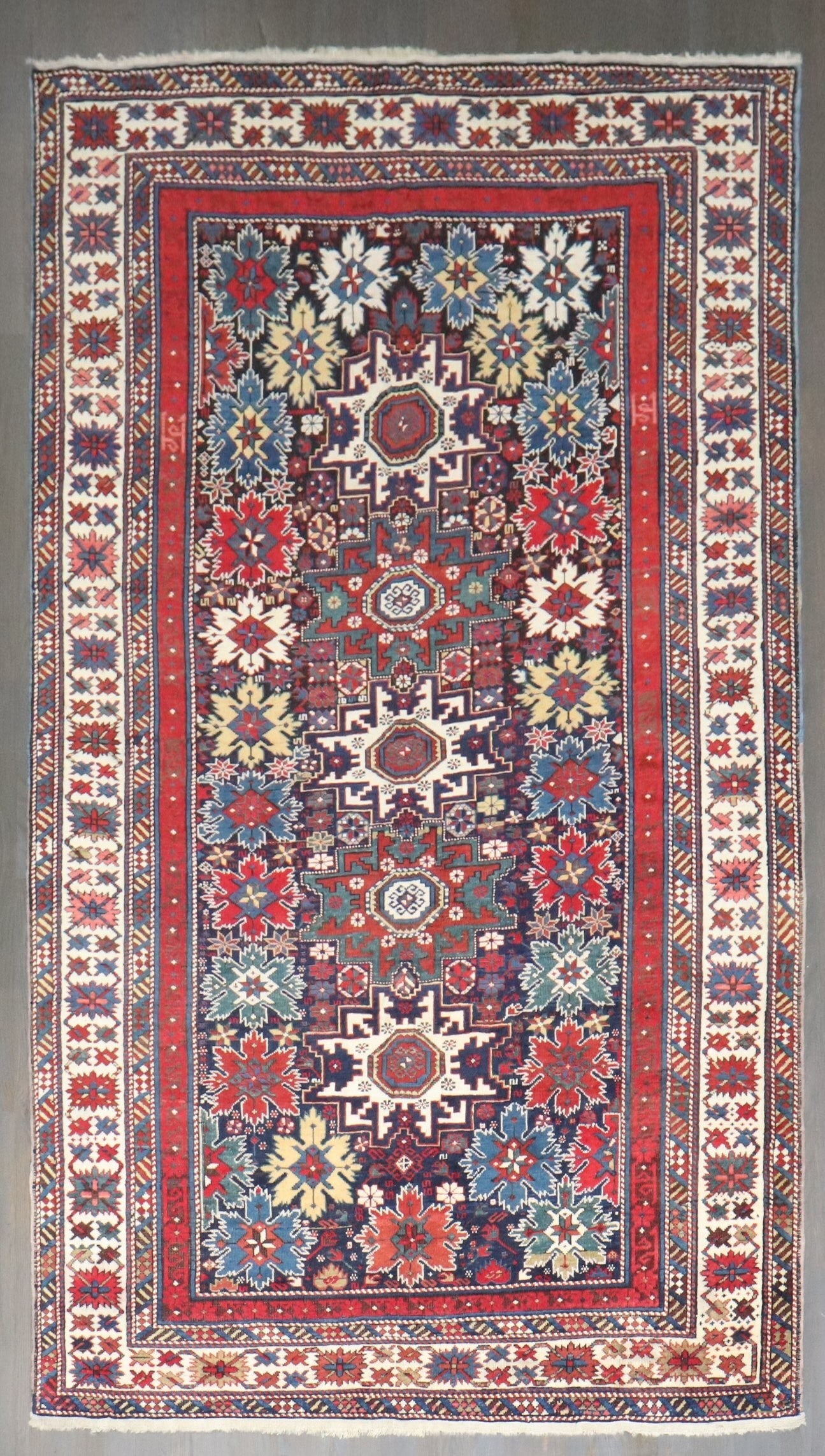 4' 9" x 8' 1" Antique Caucasian Lesghi Snowflake Pattern Rug (1 of 7)