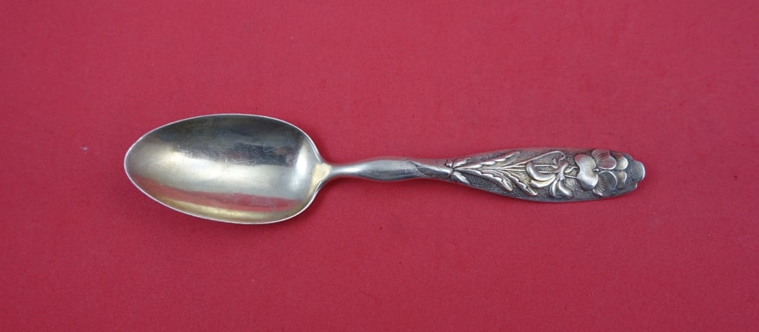 Sterling Silver Flora Pattern Teaspoon with Pansy Motif by Shiebler 5.75 Inch: Sterling Silver Flora Pattern Teaspoon with Pansy Motif by Shiebler 5.75 Inch This is a sterling silver teaspoon in the Flora pattern by Shiebler, featuring a pansy motif. The spoon is monogrammed (mo
