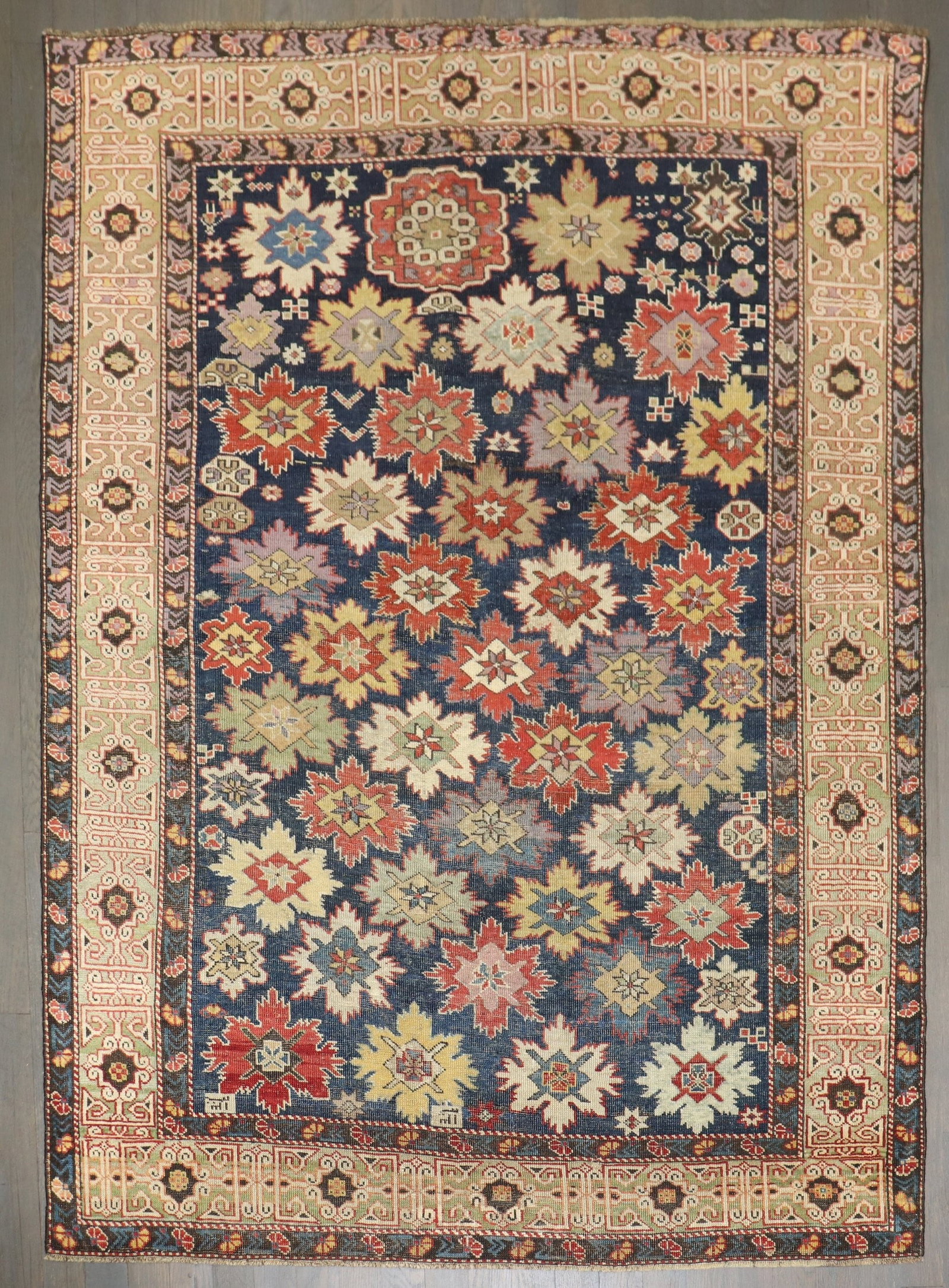 Antique Caucasian Kuba snowflake rug 3' 10" x 5': Antique Caucasian Kuba snowflake rug 3' 10" x 5' Antique Caucasian Kuba rug featuring a rare all-over snowflake design. This late 19th century piece includes small cartouches in the field near the bor