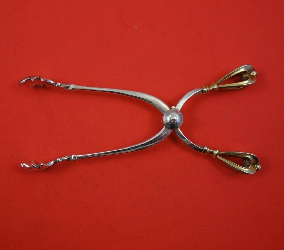 W&S Sorensen Golden Crown Sterling Silver 6" Ice Tong Serving Piece: W&S Sorensen Golden Crown Sterling Silver 6" Ice Tong Serving Piece Elevate your serving experience with this exquisite 6" ice tong from W&S Sorensen, crafted in high-quality sterling silver. The piec