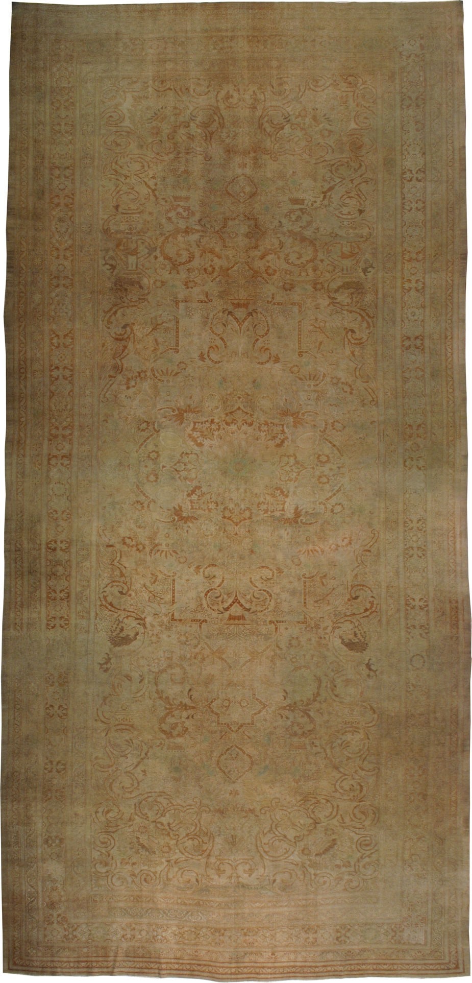 16' 6" x 34' 8" Oversize Persian Meshed Rug: 16' 6" x 34' 8" Oversize Persian Meshed Rug An early 20th century Persian Meshed rug featuring a formal palette with rust, beige, and taupe tones. This pre-owned oversize rug is well suited for large 