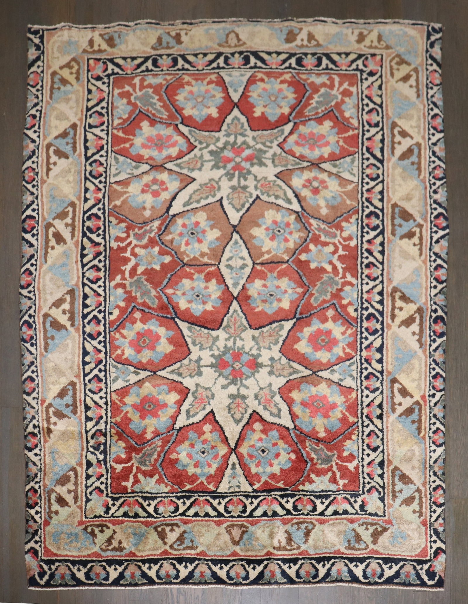 4' 4" x 5' 5" Chinese Kansu rug in Persian design: 4' 4" x 5' 5" Chinese Kansu rug in Persian design Rare early 20th-century Chinese Kansu rug featuring a traditional Persian design on a red field. This pre-owned piece is categorized as a small square