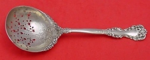International Revere Sterling Silver Sugar Sifter 5 5/8" Serving Piece: International Revere Sterling Silver Sugar Sifter 5 5/8" Serving Piece This exquisite Revere sugar sifter by International Sterling is a must-have addition to your serving collection. Crafted from hig