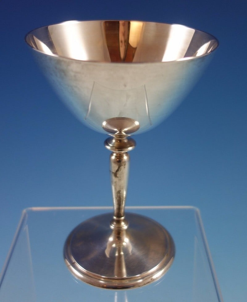 Tiffany & Co. Sterling Silver Faneuil Martini Goblet 5 1/8 Inch: Tiffany & Co. Sterling Silver Faneuil Martini Goblet 5 1/8 Inch This is a Faneuil pattern sterling silver martini glass or goblet by Tiffany & Co., crafted around 1910 in the United States. Inspired b