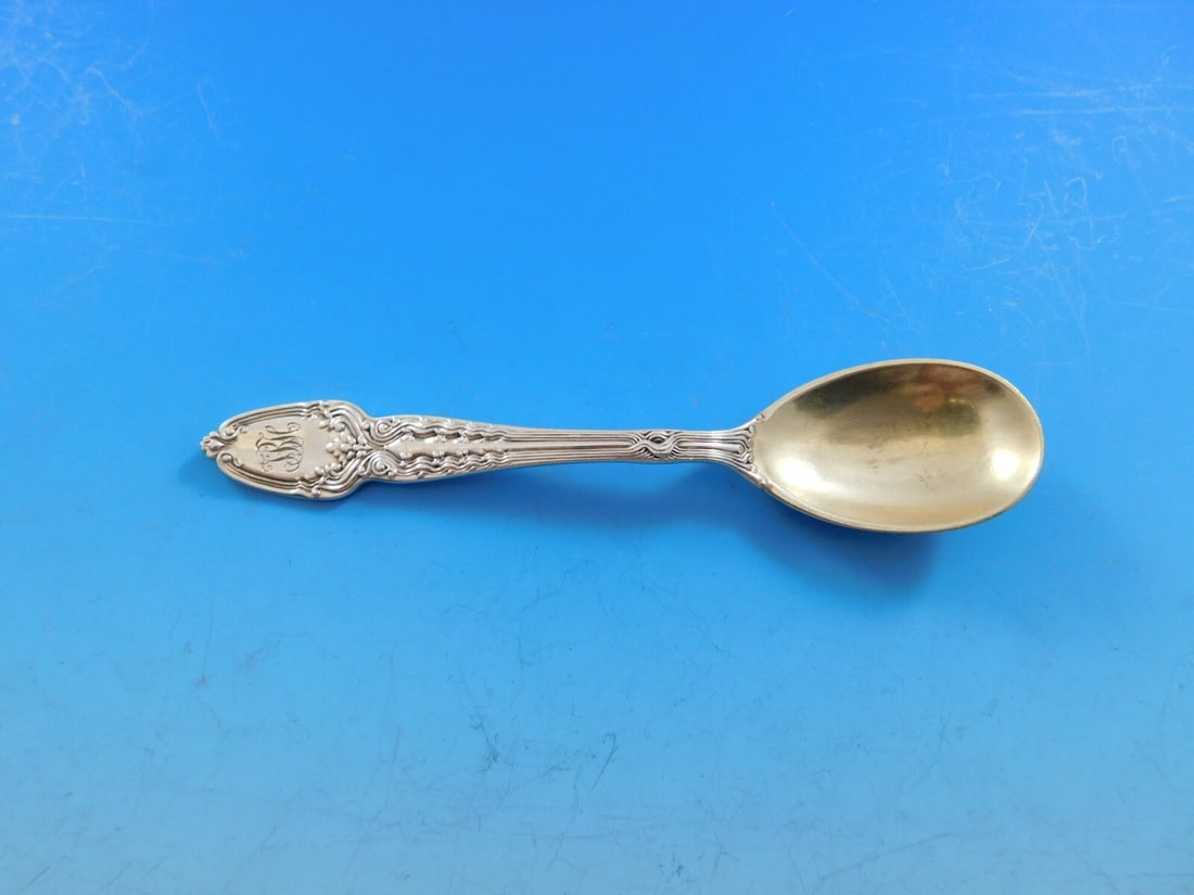 Tiffany & Co. Broom Corn Sterling Silver Egg Spoon Gold Washed 4 3/4": Tiffany & Co. Broom Corn Sterling Silver Egg Spoon Gold Washed 4 3/4" This exquisite egg spoon from Tiffany & Co. is crafted from high-quality sterling silver and features a beautiful gold-washed fini