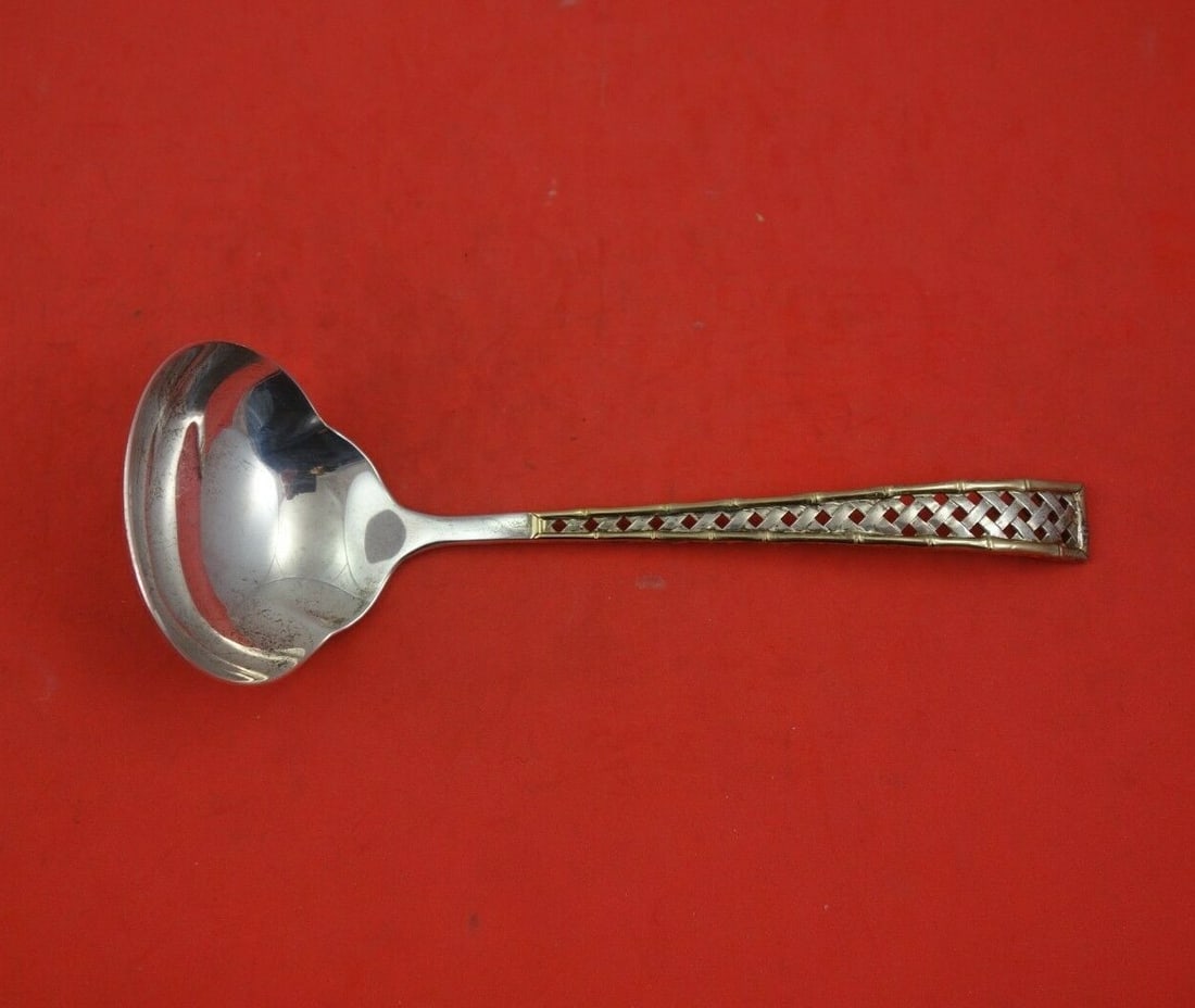 International Sterling Silver Golden Tradewinds Gravy Ladle 6.5 inches: International Sterling Silver Golden Tradewinds Gravy Ladle 6.5 inches This exquisite gravy ladle is from the Golden Tradewinds pattern by International Sterling Silver, measuring 6 1/2 inches. Crafte