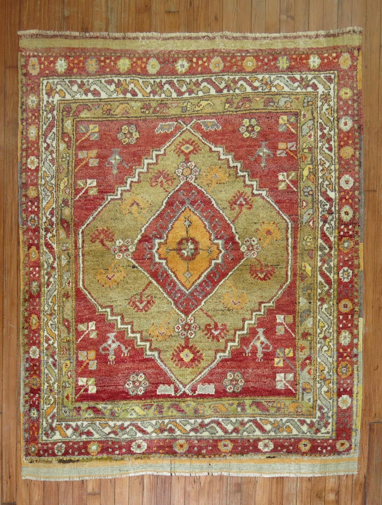 4' 7" x 5' 5" Red Turkish Anatolian Square Rug: 4' 7" x 5' 5" Red Turkish Anatolian Square Rug Small mid-20th century Turkish Anatolian rug in a square format. This pre-owned piece features a red field and is identified as an Anatolian rug. Specifi
