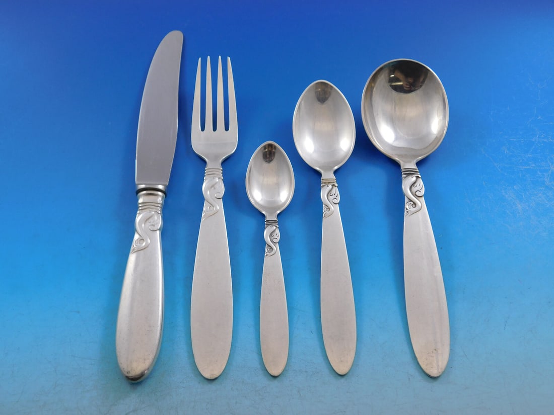 Frigast Dolphin Sterling Silver Flatware Set 34 Pieces Mid-Century Modern: Frigast Dolphin Sterling Silver Flatware Set 34 Pieces Mid-Century Modern Discover the elegance of the Dolphin pattern flatware set by Frigast, Denmark. This exquisite Mid-Century Modern service set i