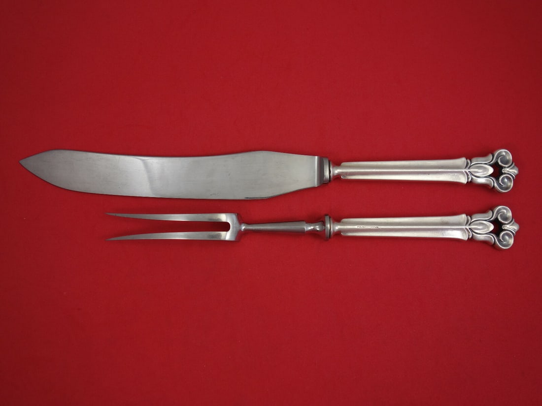 Monica by Cohr Sterling Silver 2-Piece Carving Set Knife Fork: Monica by Cohr Sterling Silver 2-Piece Carving Set Knife Fork Enhance your dining experience with the Monica by Cohr Sterling Silver Roast Carving Set. This elegant 2-piece set includes a 12 1/4" roas