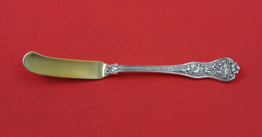 Tiffany & Co Olympian Sterling Silver Pate Knife Gold Wash 5 1/4": Tiffany & Co Olympian Sterling Silver Pate Knife Gold Wash 5 1/4" Experience the elegance of the Olympian pattern with this exquisite pate knife by Tiffany & Co. Crafted from high-quality sterling sil