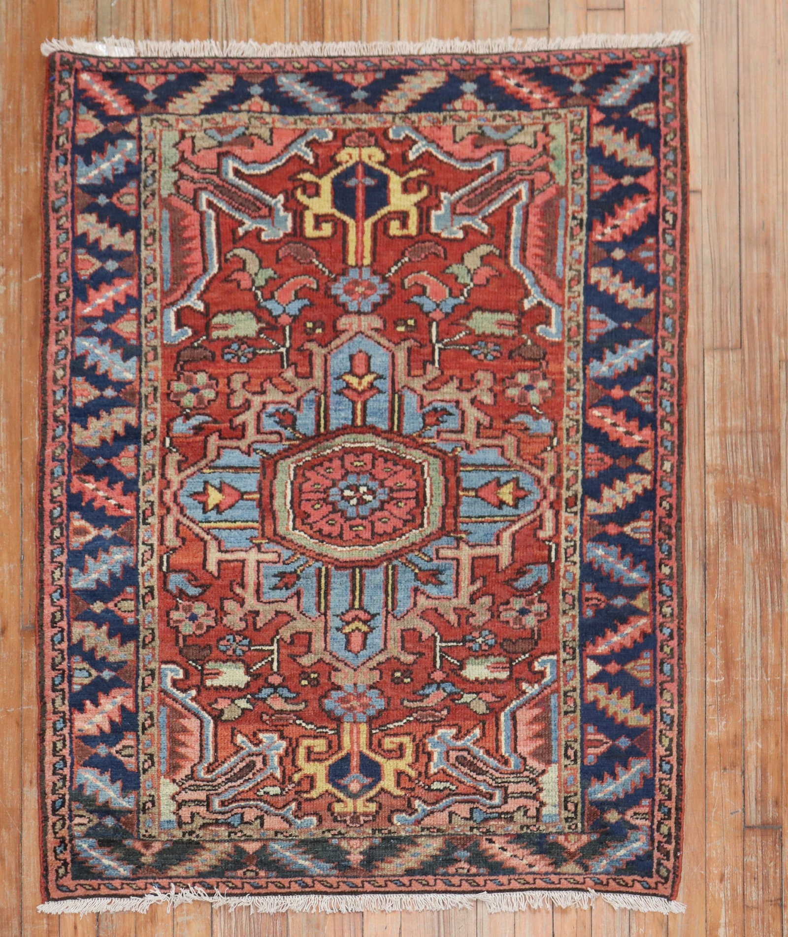 3' 3" x 4' 3" Early 20th Century Persian Serapi Heriz Rug: 3' 3" x 4' 3" Early 20th Century Persian Serapi Heriz Rug Early 20th century Persian Heriz traditional rug in a small scatter size. This pre-owned piece is identified as a Serapi/Heriz type and featur