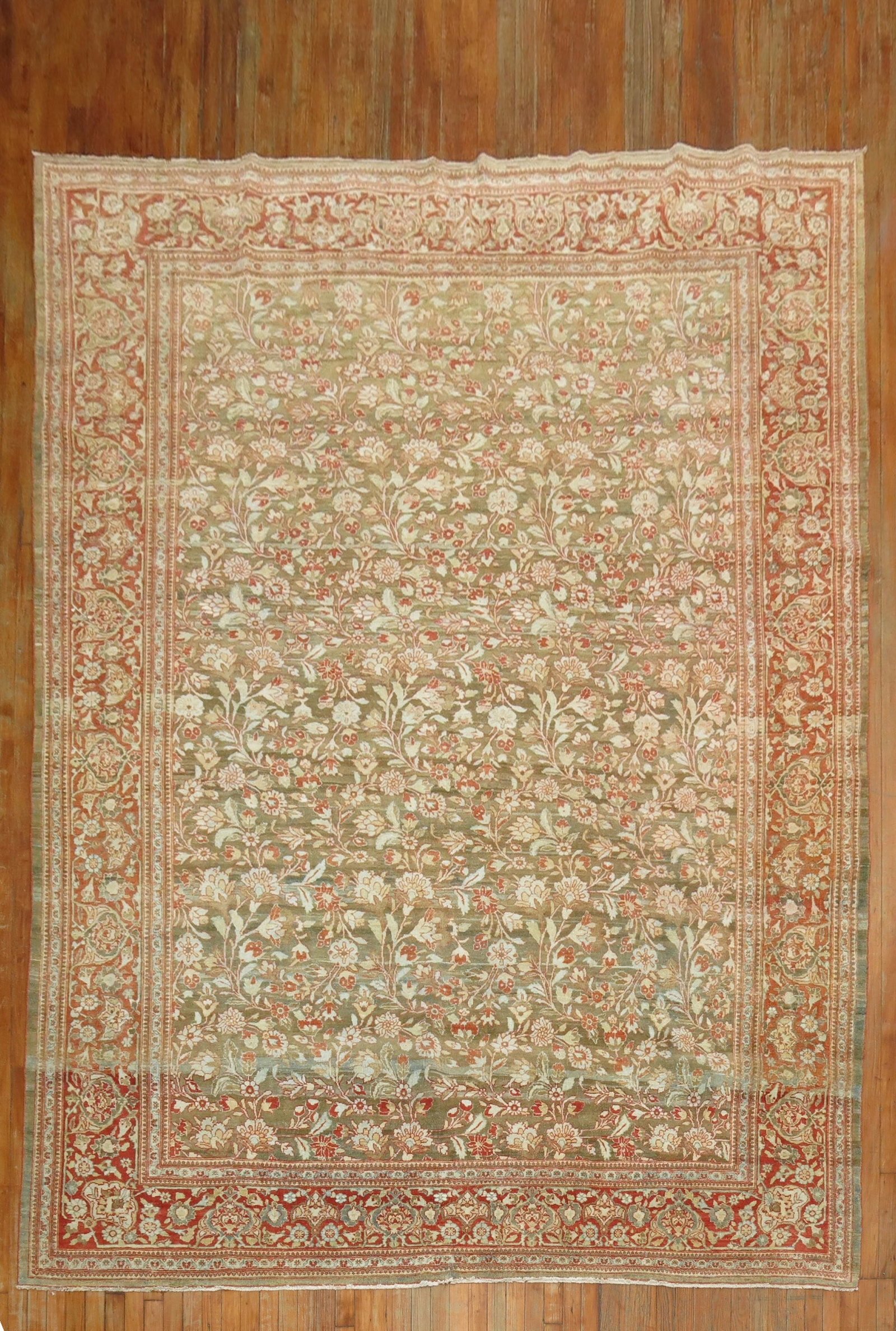 8' 6" x 11' 5" Persian Tabriz Floral Rug Brown Field: 8' 6" x 11' 5" Persian Tabriz Floral Rug Brown Field Pre-owned Persian Tabriz room size rug featuring a lovely all-over floral design on a brown field with a red border. Specifications Type: Tabriz Ca