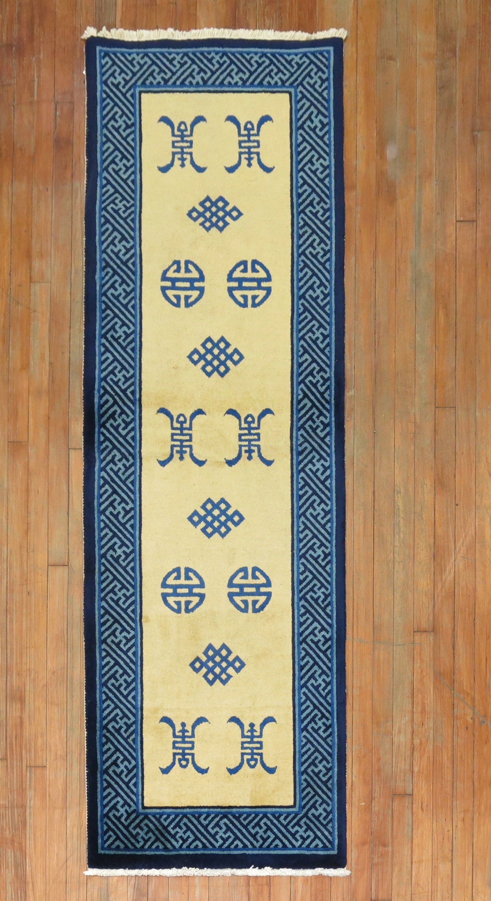 2' 6" x 7' 5" Peking Chinese Runner Rug early 20th century: 2' 6" x 7' 5" Peking Chinese Runner Rug early 20th century An early 20th century Chinese Peking runner with a classic long, narrow format. This pre-owned rug is identified as a Chinese runner in the P