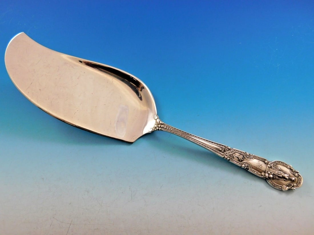 Tiffany & Co Renaissance Sterling Silver Fish Server 11 3/8 Rare Collectible: Tiffany & Co Renaissance Sterling Silver Fish Server 11 3/8 Rare Collectible This exquisite fish server from Tiffany & Co. features the intricate Renaissance pattern, a hallmark of neoclassical design