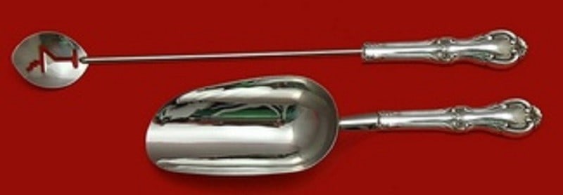 International Sterling Joan of Arc Bar Serving Set 2pc: International Sterling Joan of Arc Bar Serving Set 2pc This exquisite Joan of Arc Bar Serving Set by International Sterling is crafted from high-quality sterling silver, showcasing a classic design th