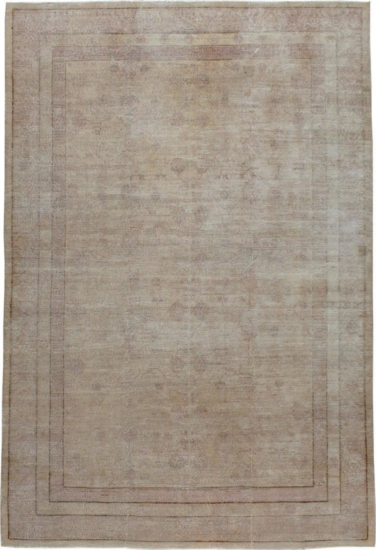 8' x 11' 7" Mid 20th Century Khotan Room Rug: 8' x 11' 7" Mid 20th Century Khotan Room Rug Vintage mid-20th century Khotan rug in a faded neutral color palette. This pre-owned room-size rug offers a classic Khotan design with a subdued, versatile