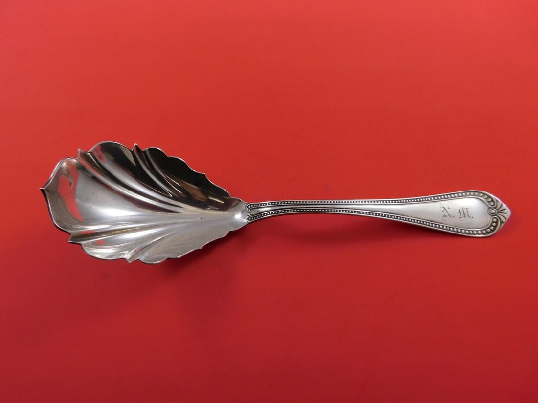 John Polhamus Sterling Silver Bead Serving Spoon 8.5 Inch Scalloped Bowl: John Polhamus Sterling Silver Bead Serving Spoon 8.5 Inch Scalloped Bowl This exquisite serving spoon by John Polhamus features a beautiful Bead pattern and a delicately scalloped shell bowl. Crafted 