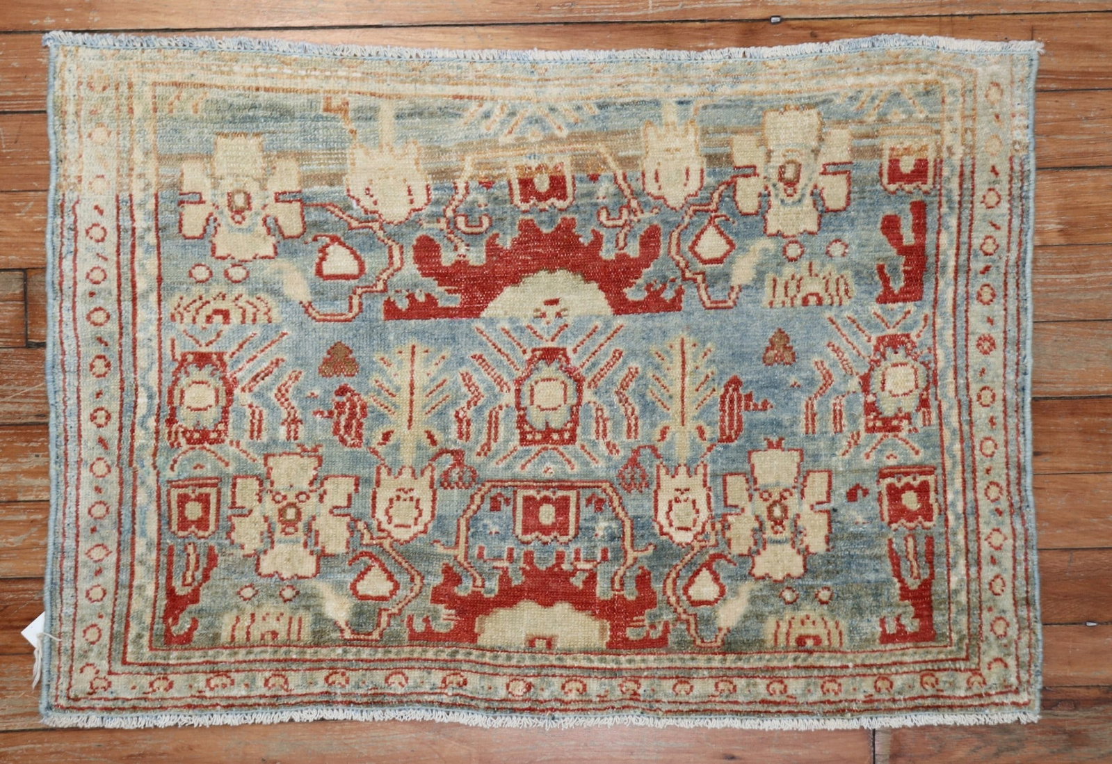 1' 9" x 2' 6" Persian Senneh Yastik Rug Mat: 1' 9" x 2' 6" Persian Senneh Yastik Rug Mat Early 20th century Persian Senneh mat with a light blue palette and highly decorative design. This rare pre-owned rug is identified as a Senneh and categori
