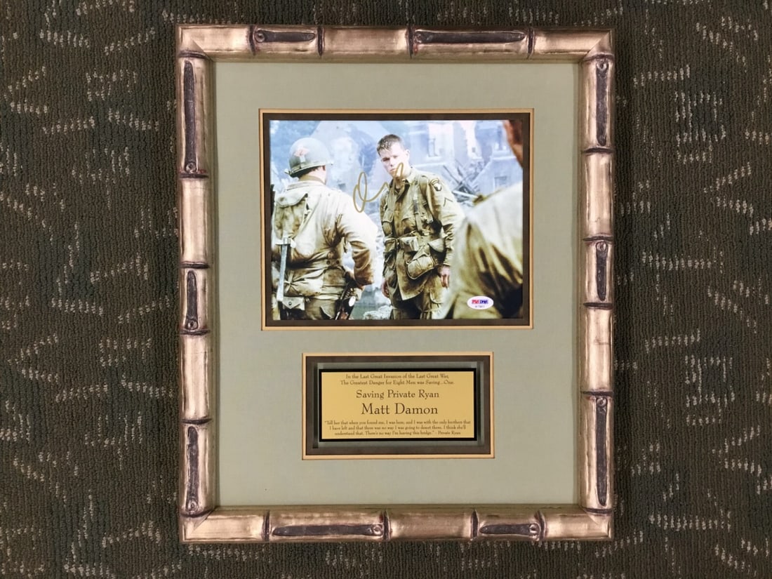 Matt Damon Signed 8x10 Photo Saving Private Ryan Custom Framed PSA/DNA COA: Matt Damon Signed 8x10 Photo Saving Private Ryan Custom Framed PSA/DNA COA This stunning custom framed display features a signed photograph of Matt Damon from the iconic film "Saving Private Ryan." Th