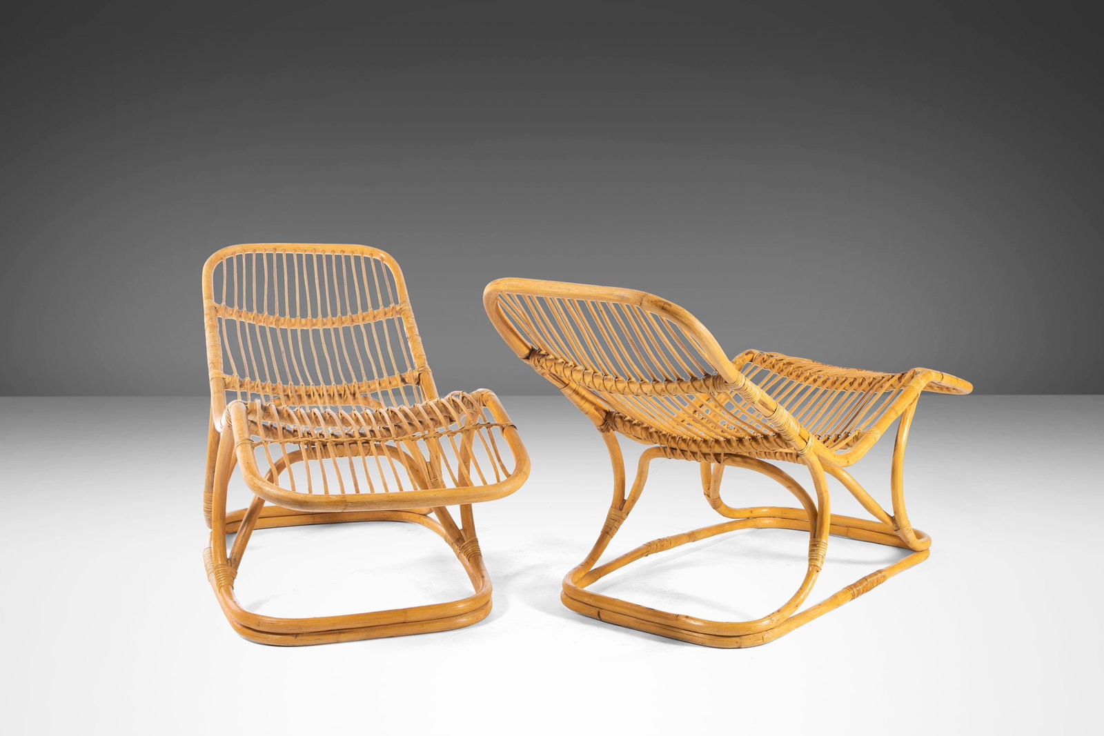 Rare Set of 2 Rattan Lounge Chairs by Tito Agnoli for Pierantonio Bonacina Italy 1963: Rare Set of 2 Rattan Lounge Chairs by Tito Agnoli for Pierantonio Bonacina Italy 1963 Discover this rare set of two rattan lounge chairs, attributed to renowned designer Tito Agnoli for Pierantonio Bo