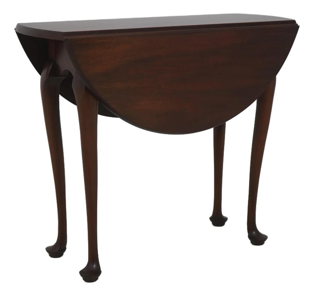 SPNEA Model 5410 Mahogany Drop-Leaf Table With Queen Anne Legs: SPNEA Model 5410 Mahogany Drop-Leaf Table With Queen Anne Legs This Henkel Harris SPNEA mahogany drop-leaf occasional table dates to the 1980s and features high-quality construction in a traditional s