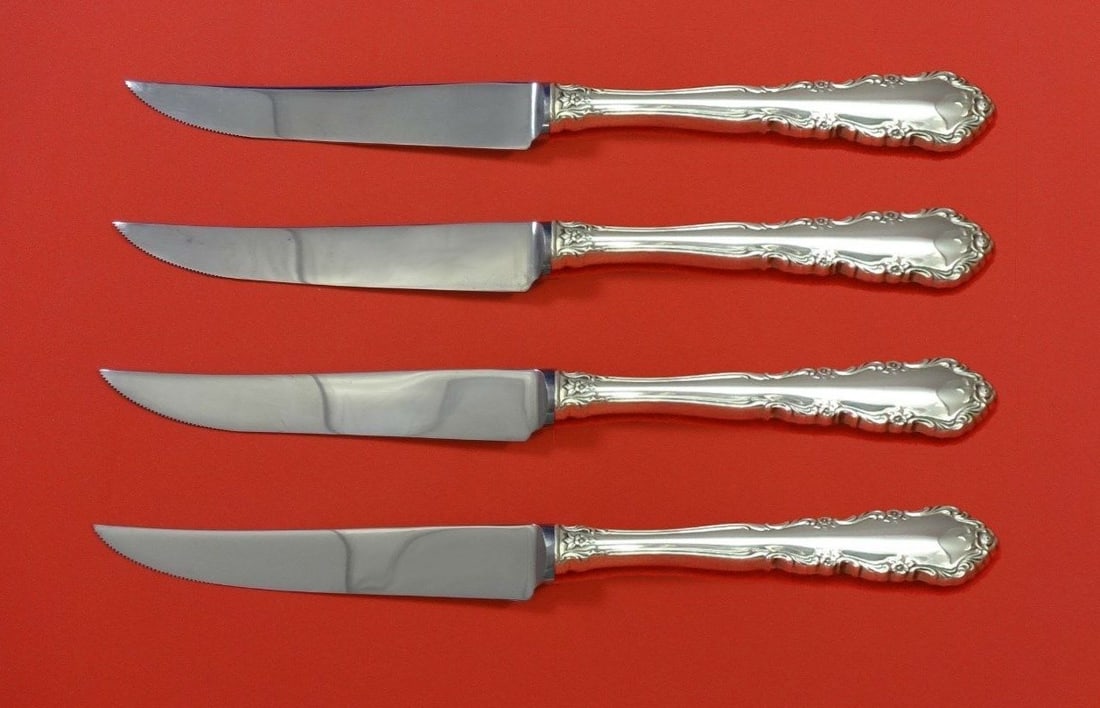 Shenandoah by Wallace Sterling Silver 4pc Custom Steak Knife Set 8 1/2": Shenandoah by Wallace Sterling Silver 4pc Custom Steak Knife Set 8 1/2" Enhance your dining experience with this exquisite 4-piece steak knife set from the Shenandoah pattern by Wallace. Each knife fe
