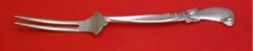 Wallace Waltz of Spring Sterling Silver Custom Spinach Fork 7 1/4": Wallace Waltz of Spring Sterling Silver Custom Spinach Fork 7 1/4" This exquisite spinach fork is crafted from high-quality sterling silver and features the elegant "Waltz of Spring" pattern by Wallac