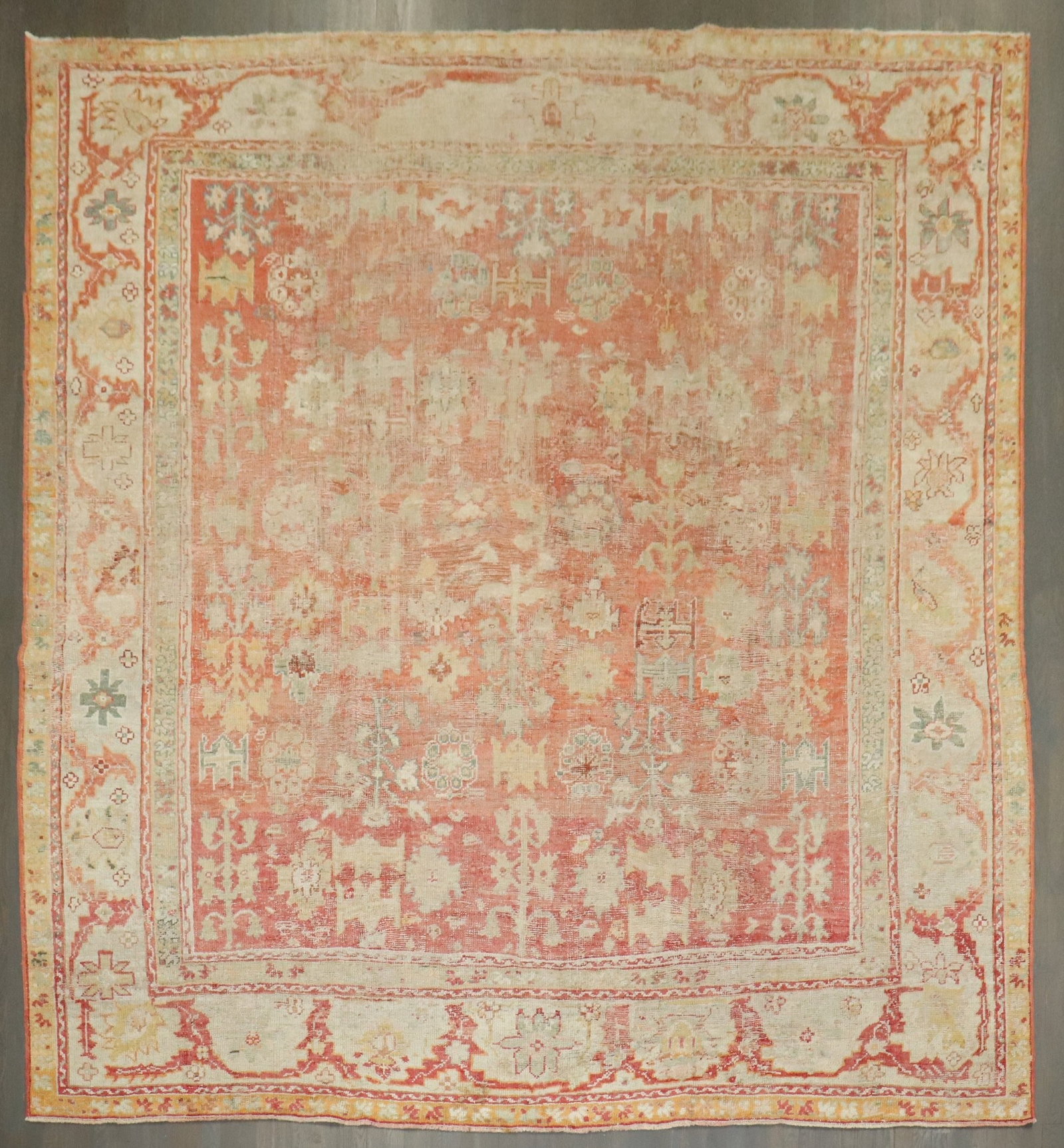10' 6" x 11' Square Turkish Oushak Room Rug Soft Red: 10' 6" x 11' Square Turkish Oushak Room Rug Soft Red Early 20th-century antique Turkish Oushak rug with a square room-size format and a softly worn appearance. This pre-owned piece is described as Ous