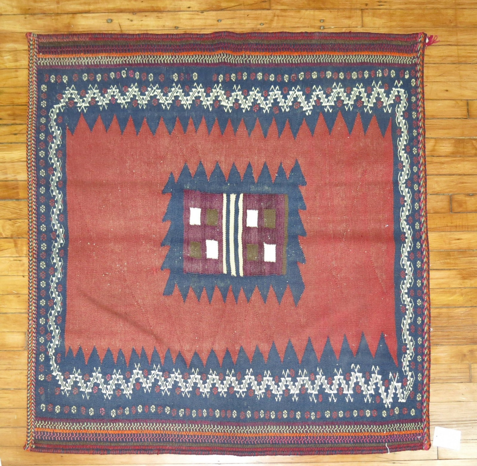 4' 2" x 4' 4" Persian Sofreh Soumac Rug: 4' 2" x 4' 4" Persian Sofreh Soumac Rug Mid 20th century Sofreh Persian Kilim in Soumac weave. This pre-owned small square textile features geometric patterning consistent with the provided design des