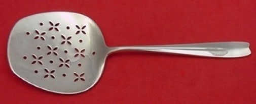 Tiffany & Co Cordis Sterling Silver Tomato Server 7 3/4 inch: Tiffany & Co Cordis Sterling Silver Tomato Server 7 3/4 inch Enhance your dining experience with the Cordis Tomato Server by Tiffany & Co. This exquisite piece is crafted from high-quality sterling si