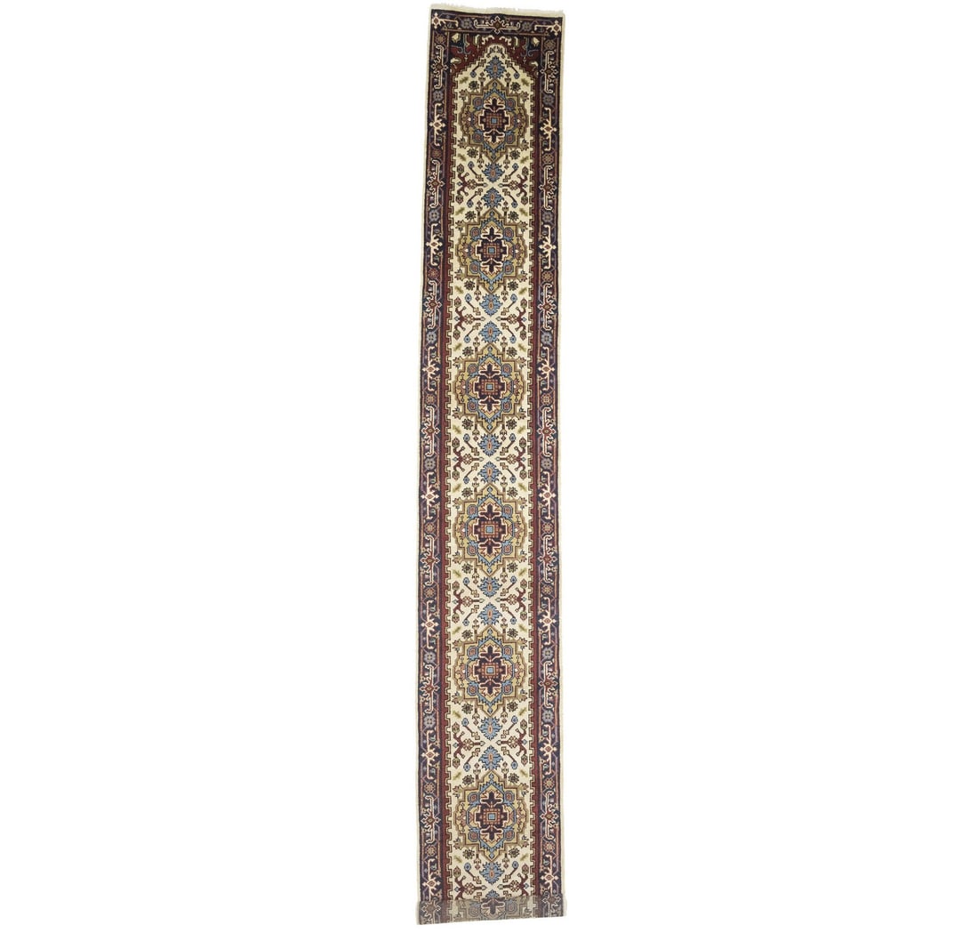 Hand Knotted Wool Serapi Floral Runner 2'7 x 18'11: Hand Knotted Wool Serapi Floral Runner 2'7 x 18'11 Enhance your space with this stunning oversized Serapi Oriental runner rug, perfect for hallways or kitchens. Hand-knotted in India from high-quality