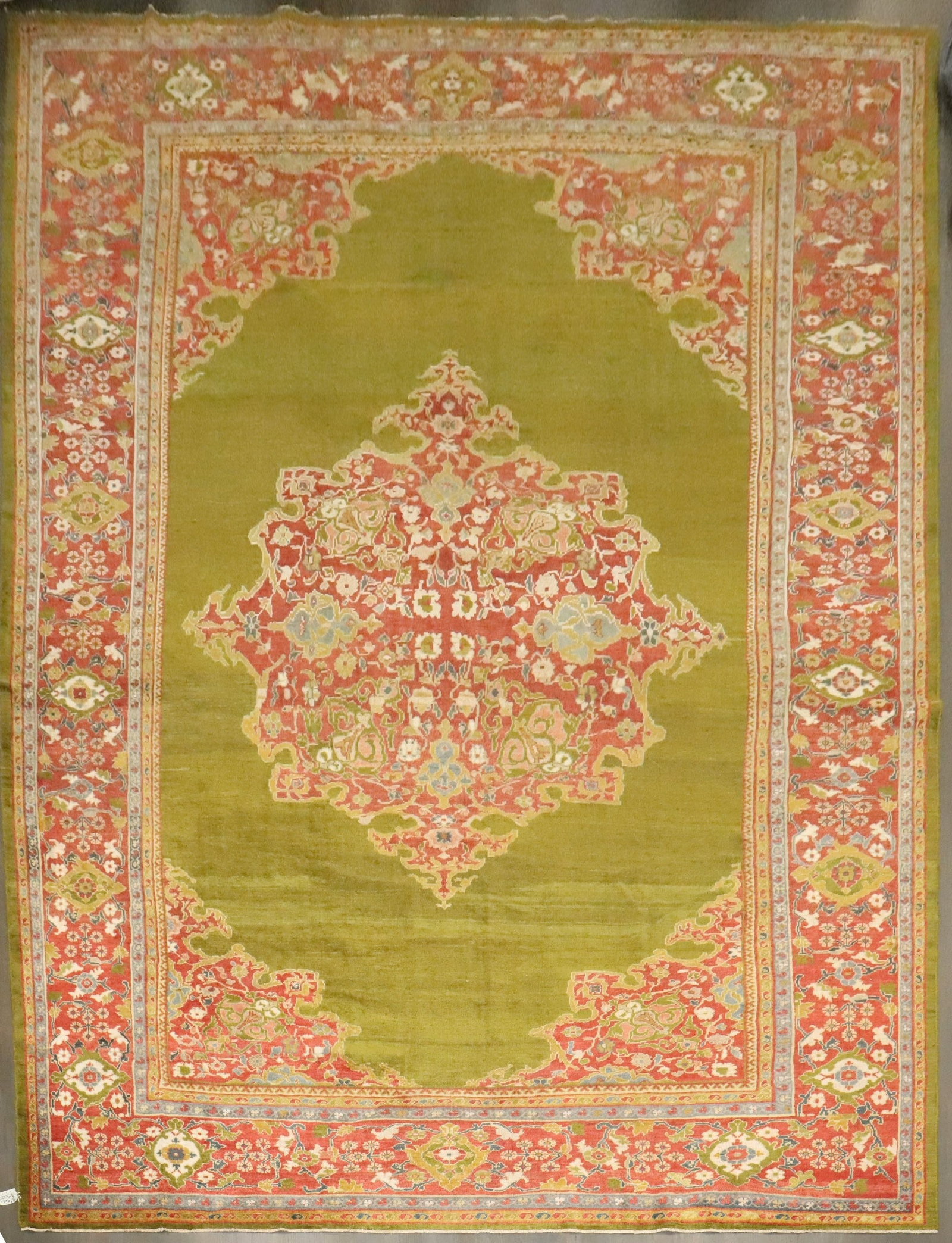 11' 8" x 16' 8" Antique Green Sultanabad Mahal Rug: 11' 8" x 16' 8" Antique Green Sultanabad Mahal Rug Late 19th century green Ziegler Mahal rug with an open field design. This pre-owned oversize rug is identified as a Sultanabad/Mahal type. Specificat