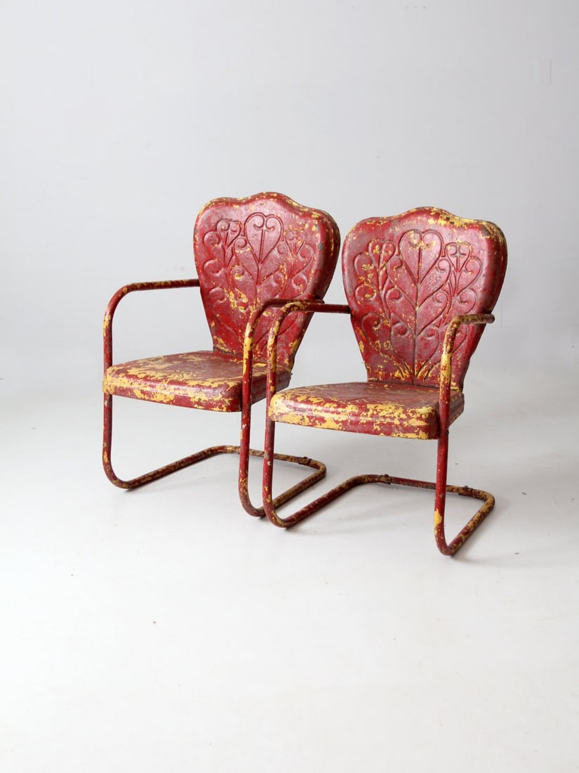 Vintage Mid Century Art Deco Metal Bouncer Chairs Pair: Vintage Mid Century Art Deco Metal Bouncer Chairs Pair This pair of mid 20th century vintage patio lounge chairs features a charming art deco design with steel metal bouncer frames adorned with presse