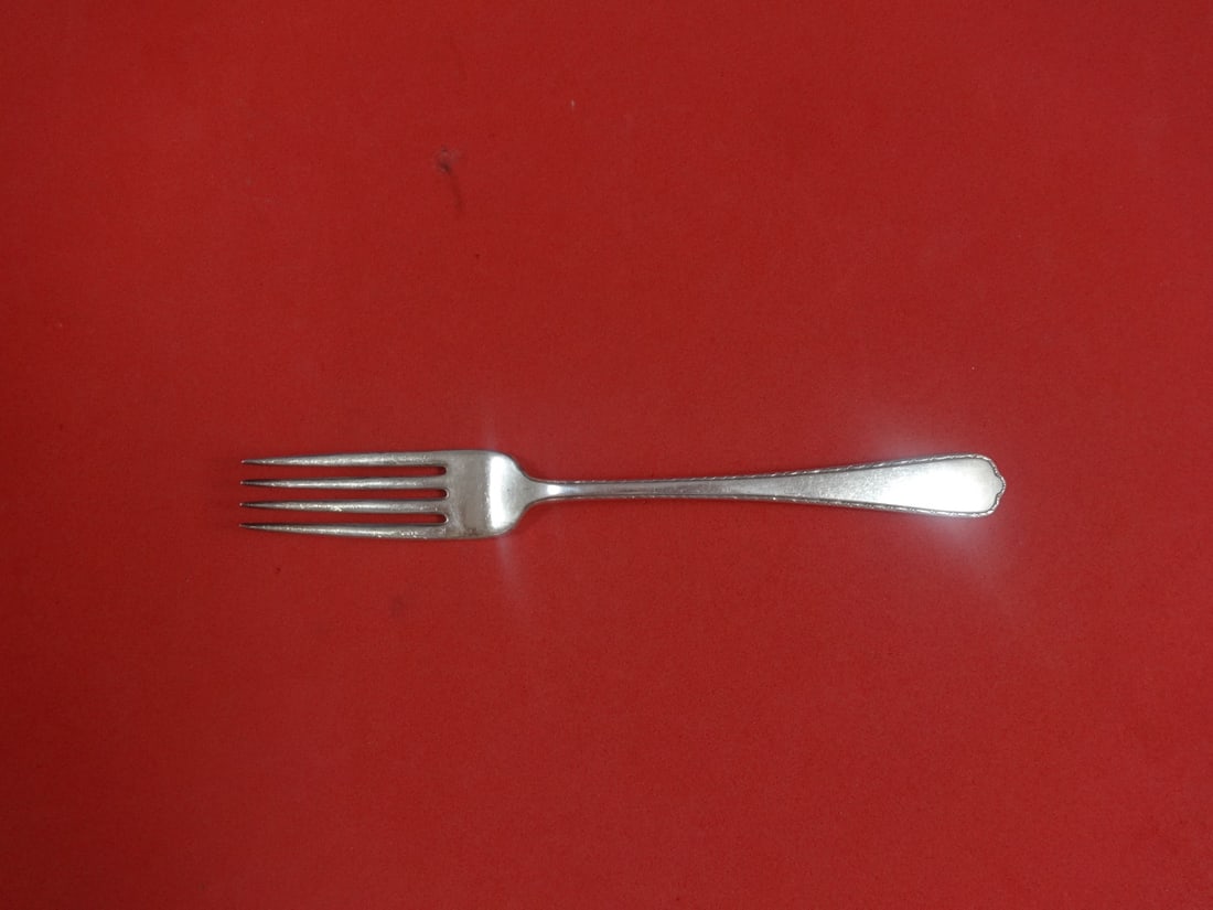 7" Sterling Silver Regular Fork International Windemere Pattern: 7" Sterling Silver Regular Fork International Windemere Pattern Sterling silver regular fork in the Windemere pattern by International Silver. This pre-owned piece is not monogrammed and is in excelle