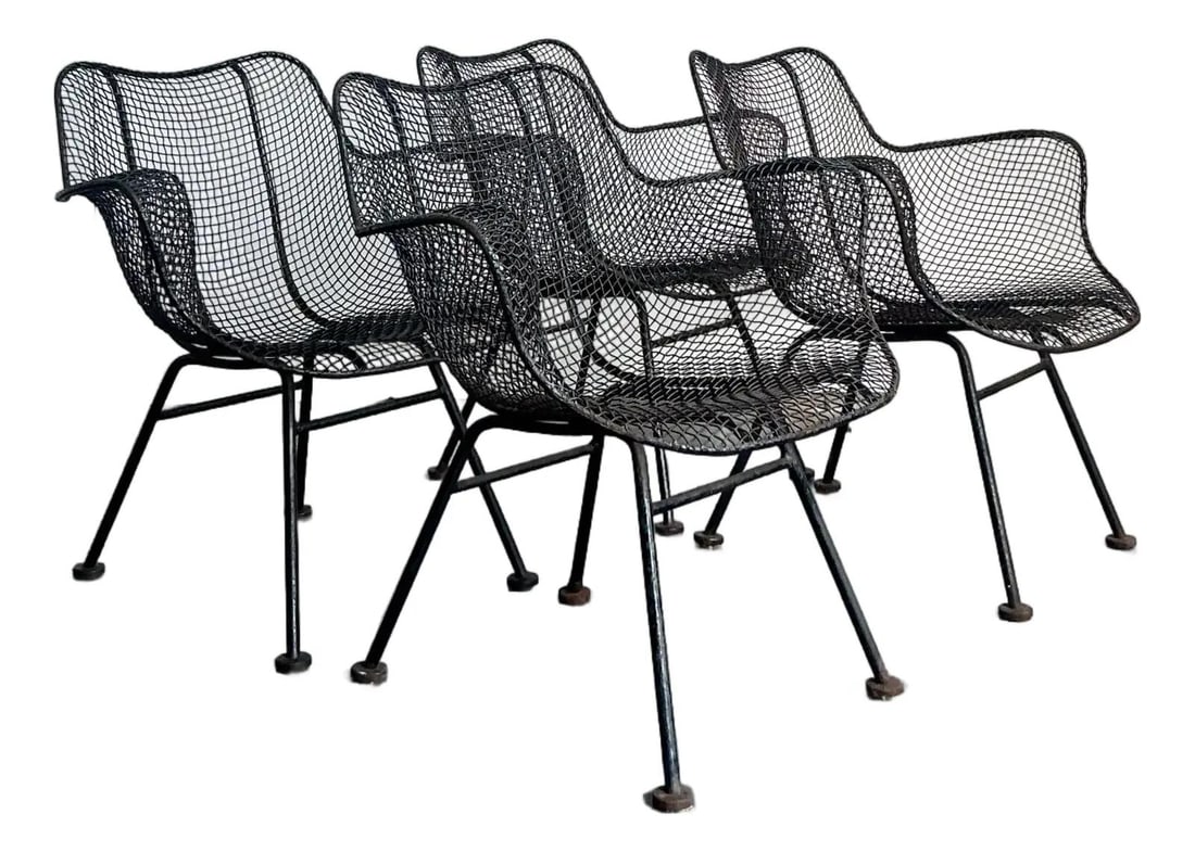 Set of Four Sculptura Wrought Iron Dining Armchairs by Russell Woodard: Set of Four Sculptura Wrought Iron Dining Armchairs by Russell Woodard This set of four vintage Russell Woodard "Sculptura" dining armchairs, designed in the 1950s, exemplifies Mid-Century Modern styl