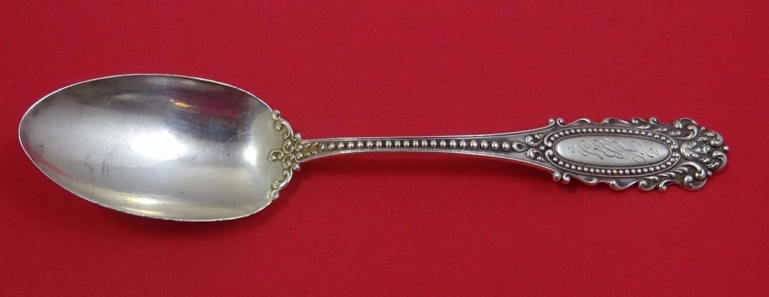 Watson Eugenie Sterling Silver Serving Spoon 8 1/4 Monogrammed: Watson Eugenie Sterling Silver Serving Spoon 8 1/4 Monogrammed A Watson Eugenie sterling silver serving spoon with an ornate engraved handle design. It is monogrammed, with monos varying, and is in ex