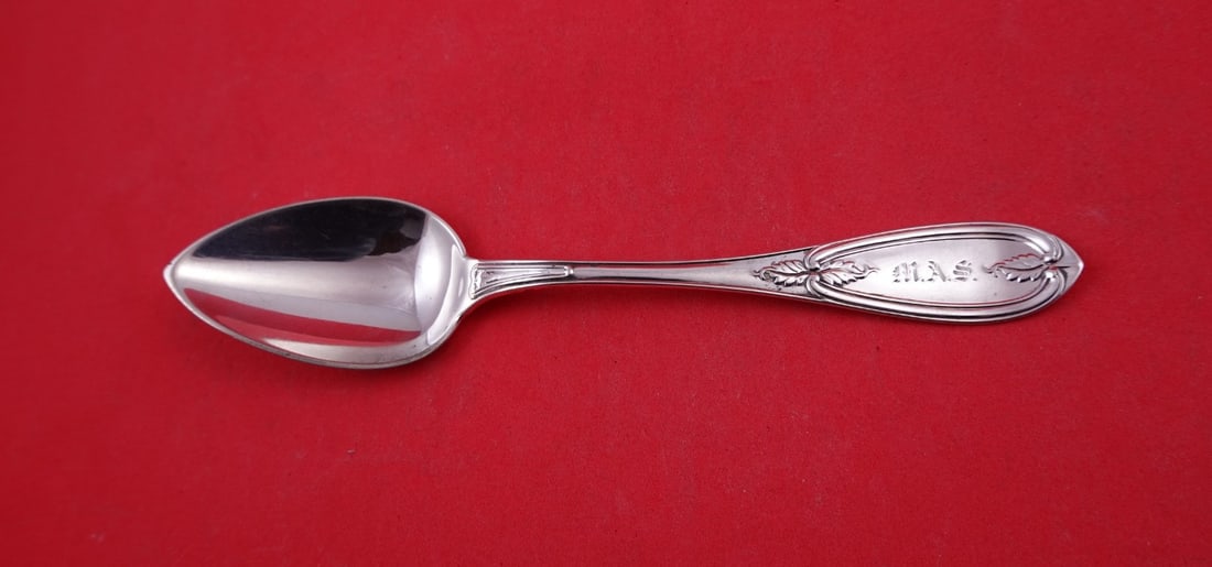 Wood and Hughes Olive Sterling Silver Soup Spoon 7 1/4": Wood and Hughes Olive Sterling Silver Soup Spoon 7 1/4" Sterling silver place soup spoon in the Olive pattern by Wood & Hughes. This pre-owned spoon is monogrammed, with monos varying, and is noted to