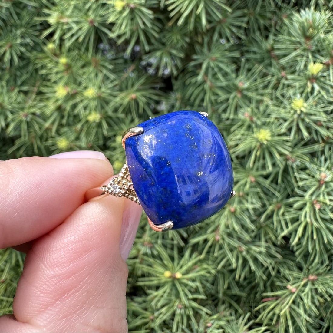 14k Yellow Gold Cocktail Ring with Cushion Lapis and 2 Diamonds: 14k Yellow Gold Cocktail Ring with Cushion Lapis and 2 Diamonds Women's cocktail ring featuring a large natural lapis lazuli cabochon accented by two natural diamonds and beaded side detailing. Crafte