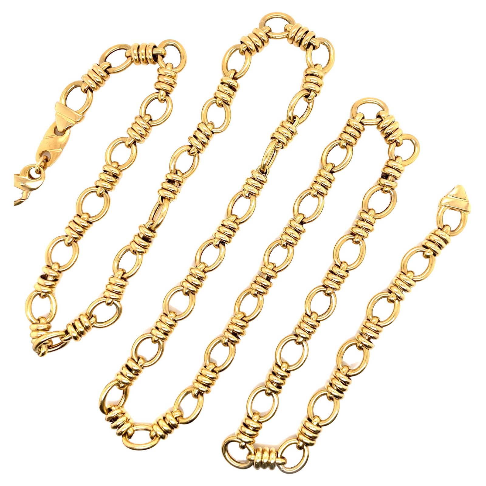 30.5 Inch 14K Yellow Gold Link Necklace 42.5 Grams: 30.5 Inch 14K Yellow Gold Link Necklace 42.5 Grams Contemporary 14 karat yellow gold link necklace with circular links and wrapped detailing. This piece weighs 42.5 grams and is presented in excellent