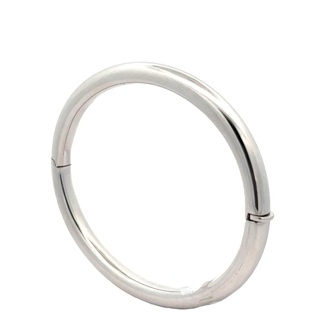 14k White Gold Hinged Tube Bangle Bracelet Stackable: 14k White Gold Hinged Tube Bangle Bracelet Stackable Polished 14k white gold hinged bangle bracelet with a hollow tube design and stackable profile. This unisex bracelet features a double snap push cl