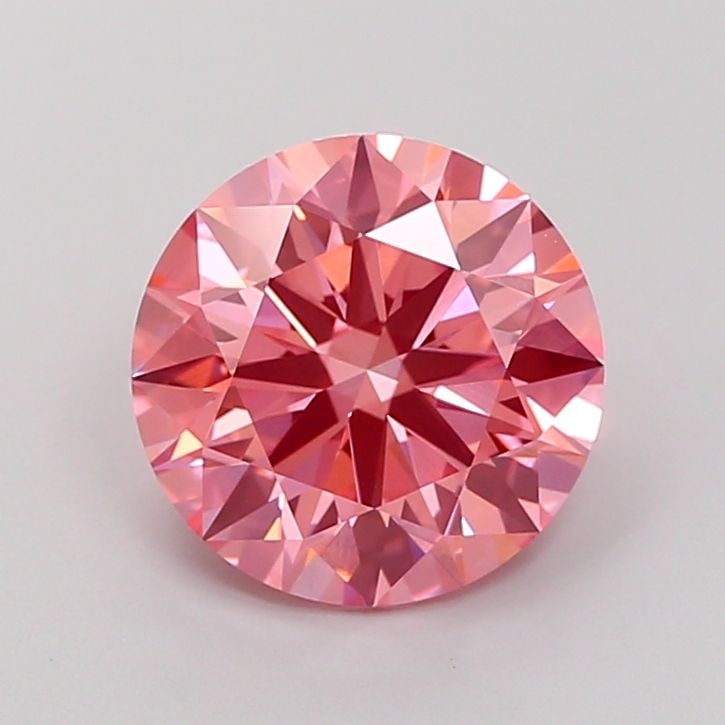 Ideal Loose Diamond - ROUND 3.23ct Fancy Vivid Pink VS1: Ideal Loose Diamond - ROUND 3.23ct Fancy Vivid Pink VS1 Source: This is a real non-mined Diamond that has been grown in a lab Shape: ROUND Carats: 3.23 Color: Fancy Vivid Pink Certification: IGI Video