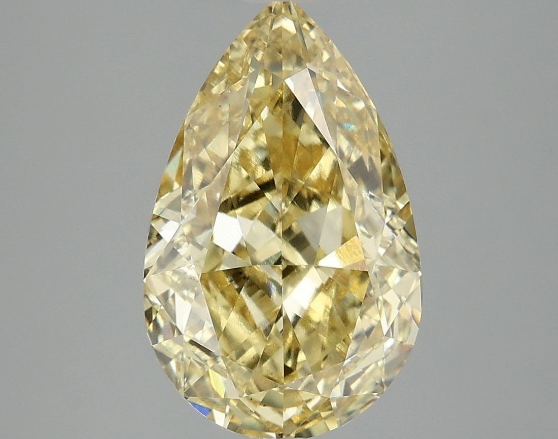 Loose Diamond - PEAR 4.1ct Fancy Vivid Yellow VS1: Loose Diamond - PEAR 4.1ct Fancy Vivid Yellow VS1 Source: This is a real non-mined Diamond that has been grown in a lab Shape: PEAR Carats: 4.1 Color: Fancy Vivid Yellow Certification: IGI Video: