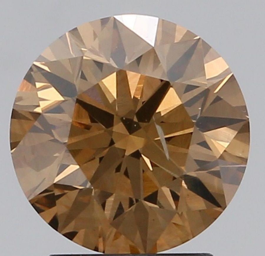 Loose Diamond - ROUND 2.07ct Fancy Brown SI2: Loose Diamond - ROUND 2.07ct Fancy Brown SI2 Source: Natural Shape: ROUND Carats: 2.07 Color: Fancy Brown Certification: GIA Video: