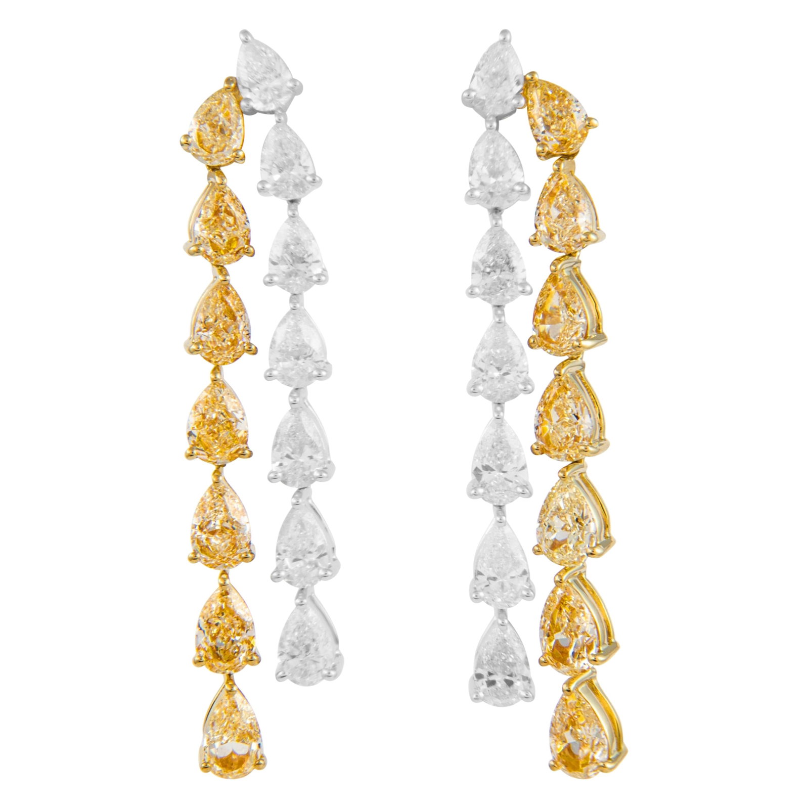 18k Two Tone Diamond Drop Earrings 8.66ct: 18k Two Tone Diamond Drop Earrings 8.66ct Pair of contemporary drop earrings set with fancy yellow and white pear-cut diamonds in two-tone 18k yellow and white gold. The design features alternating pe