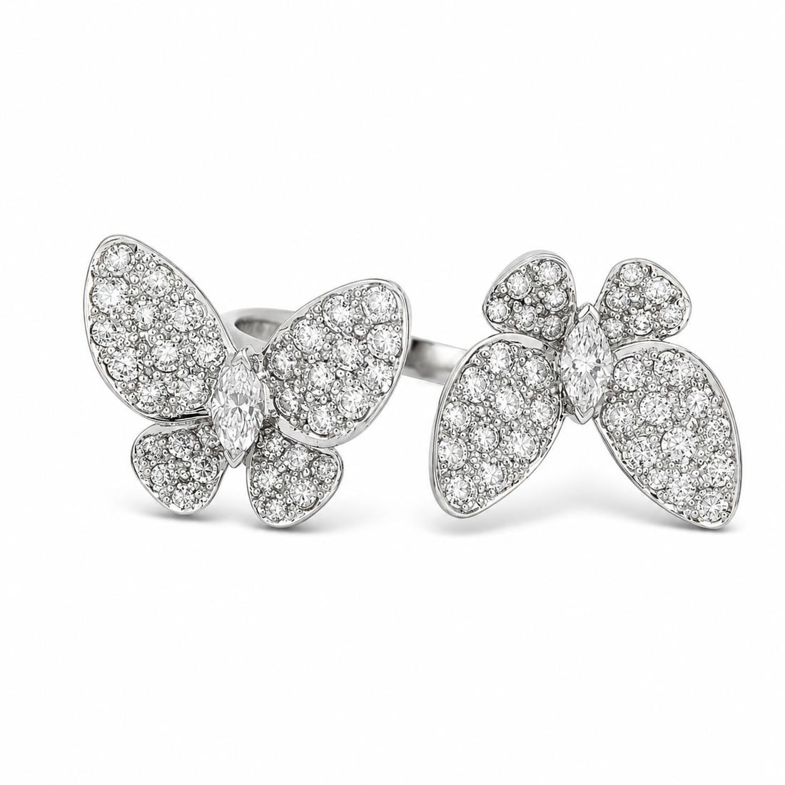 Dual Butterfly Cocktail Ring in 18k White Gold with 1.50ctw Diamonds: Dual Butterfly Cocktail Ring in 18k White Gold with 1.50ctw Diamonds Pre-owned cocktail ring featuring a dual butterfly design set with natural genuine diamonds in solid 18k white gold. The ring inclu