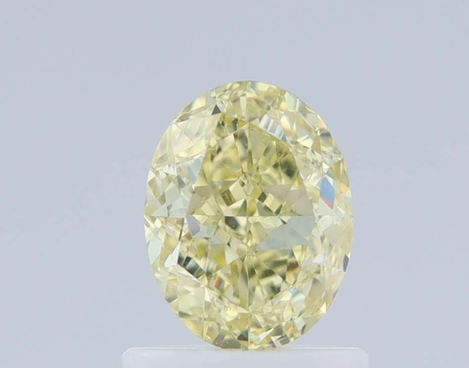 Loose Diamond - OVAL 1.0ct Fancy Yellow VVS2: Loose Diamond - OVAL 1.0ct Fancy Yellow VVS2 Source: Natural Shape: OVAL Carats: 1.0 Color: Fancy Yellow Certification: GIA Video: