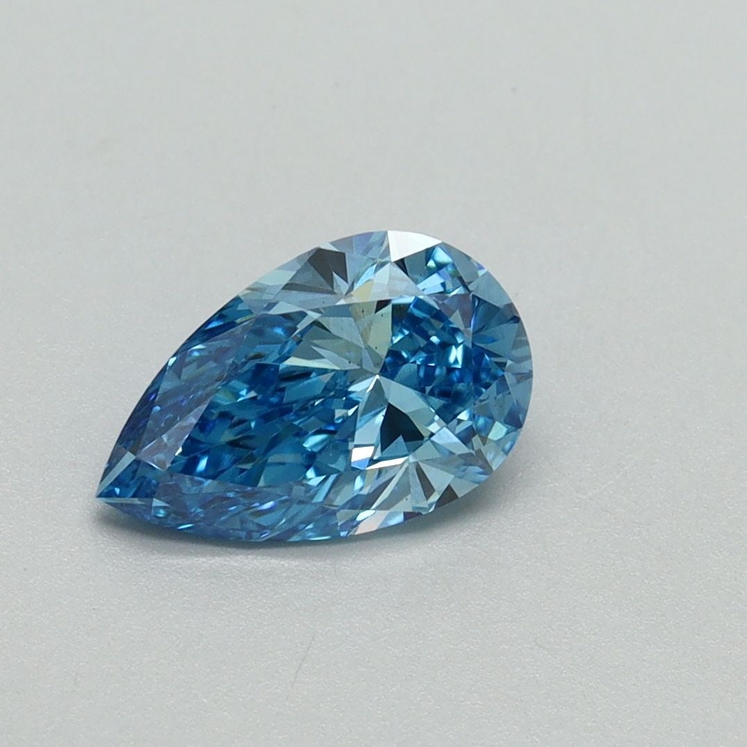 Loose Diamond - PEAR 1.01ct Fancy Vivid Blue VS2: Loose Diamond - PEAR 1.01ct Fancy Vivid Blue VS2 Source: This is a real non-mined Diamond that has been grown in a lab Shape: PEAR Carats: 1.01 Color: Fancy Vivid Blue Certification: IGI Video: Video