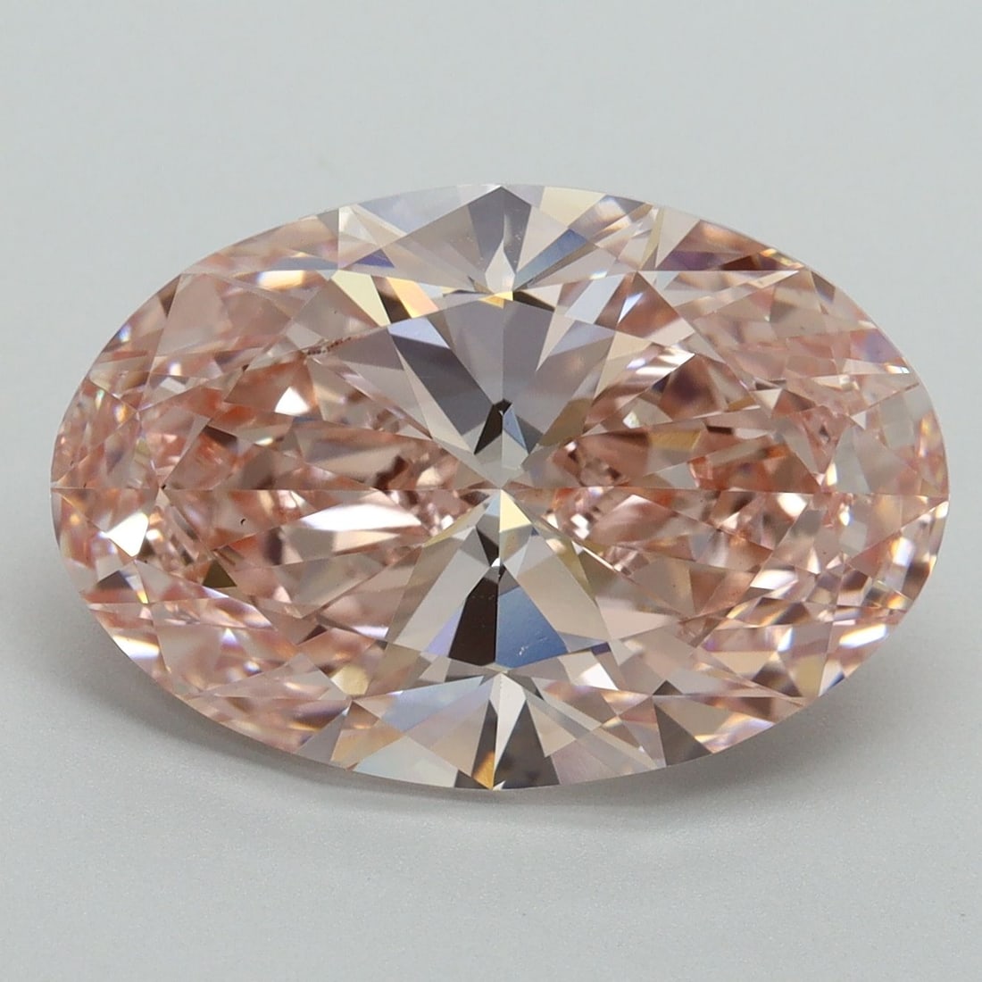Loose Diamond - OVAL 7.37ct Fancy Vivid Pink VS1: Loose Diamond - OVAL 7.37ct Fancy Vivid Pink VS1 Source: This is a real non-mined Diamond that has been grown in a lab Shape: OVAL Carats: 7.37 Color: Fancy Vivid Pink Certification: IGI Video: